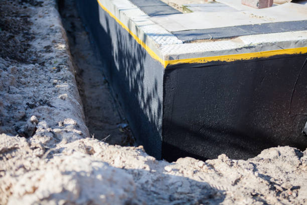 Professional Exterior Waterproofing technician working in Clifford, IN